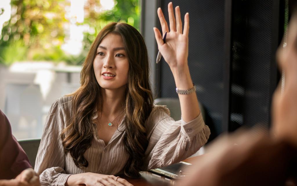 Student raising her hand